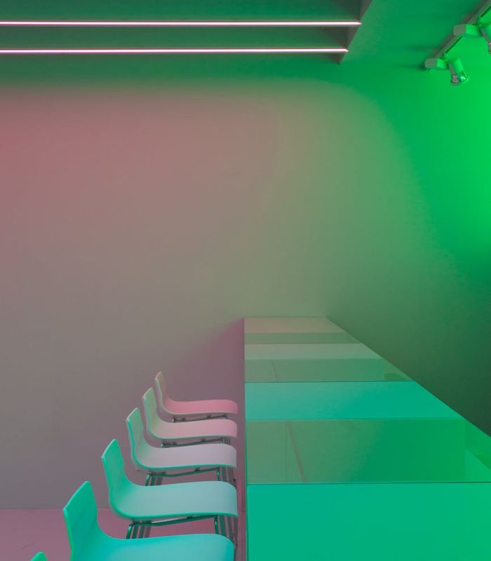 Abstract modern creative workspace with neon lighting and clean lines